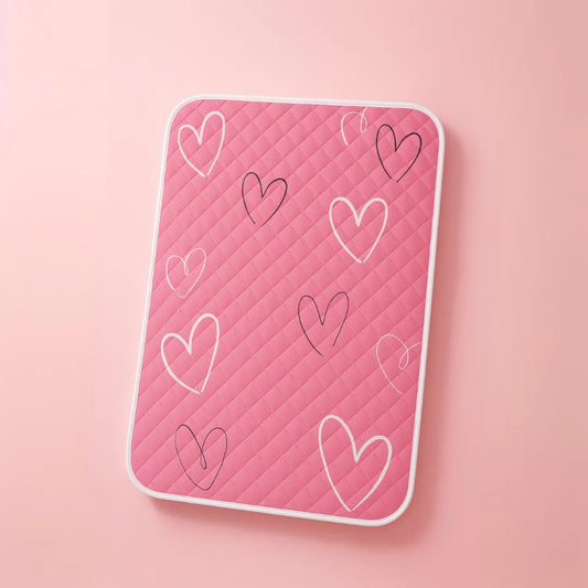 Protège matelas lavables et absorbants coeurs roses