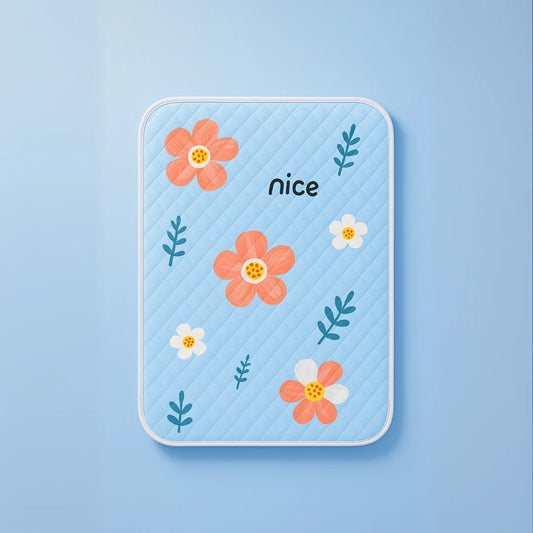 Protège matelas lavables et absorbants fleurs oranges